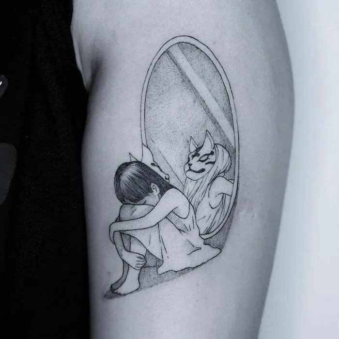 Tattoo depicting a child sitting, with a mirror reflection showing a masked figure, symbolizing mental health struggles.