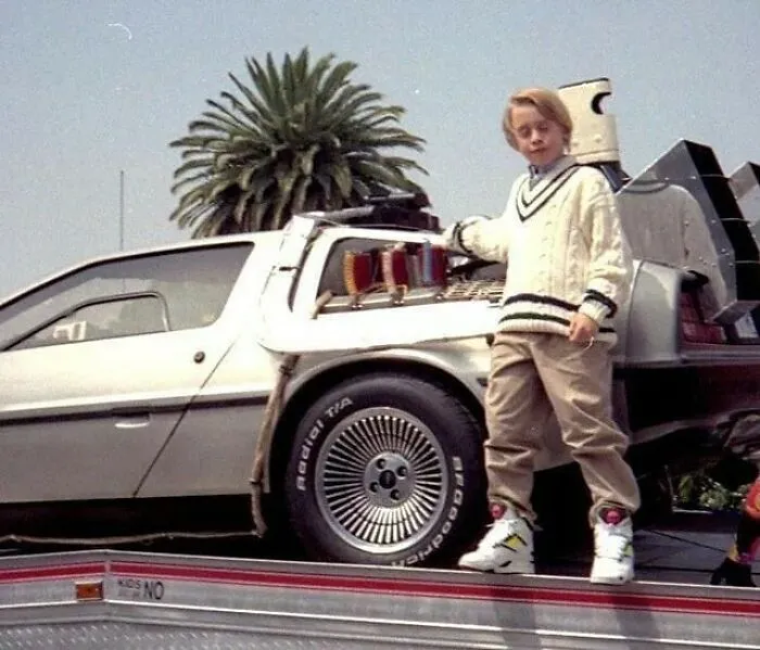 Macaulay Culkin In Reebok Pump Twilight Zones While Leaning On The Delorean