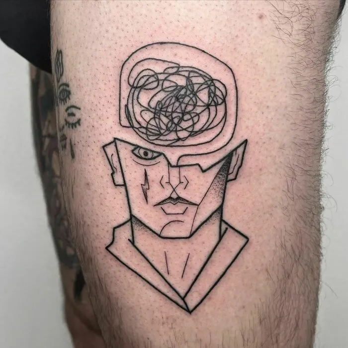 Line art tattoo of a face with an open head, featuring tangled lines symbolizing mental health struggles.
