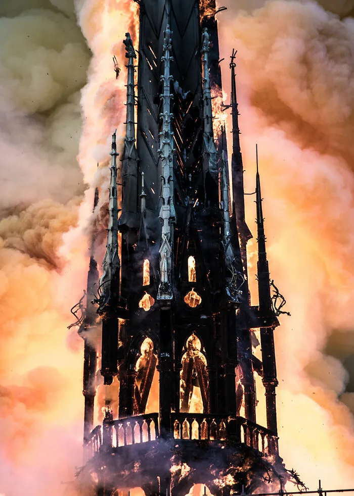 Notre Dame's Spire Taken From The Saint Louis Bridge During The 15th April 2019 Fire By Levrier Guillaume