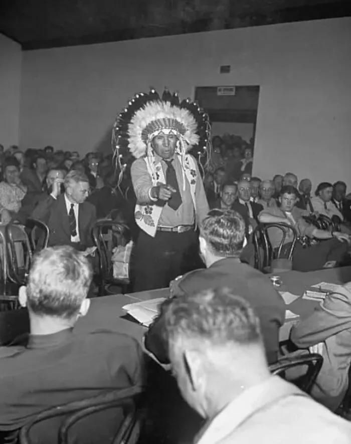 Indian Chief Speaking To Army Officers About The Construction Of Garrison Dam. North Dakota, 1946