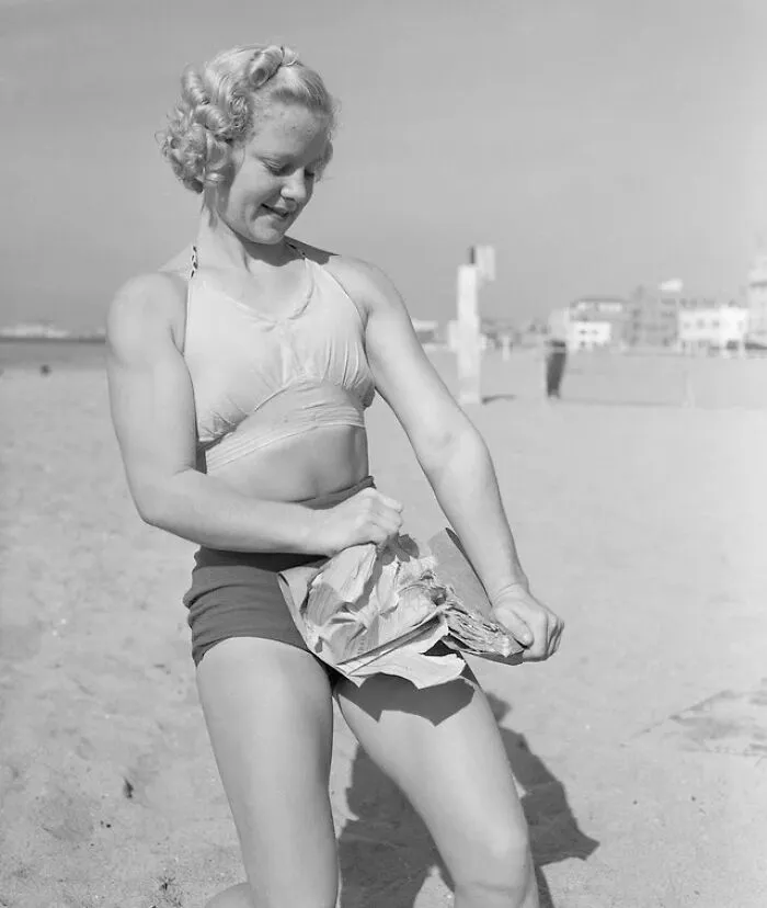 Bodybuilder Relna Brewer Showing Her Strength By Ripping A Phone Book Apart, 1938