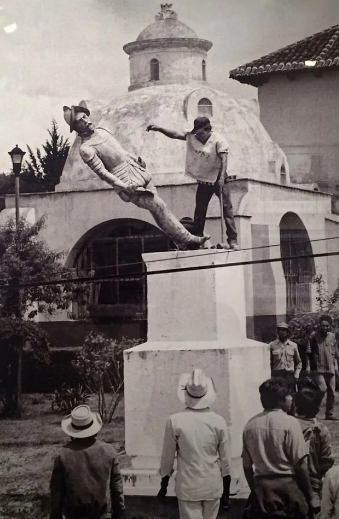 A Indigenous Man Topples A Statue Of Spanish Conquistador Diego De Mazariegos On The 500th Year Anniversary Of The Discovery Of The Americas. Chiapas, Mexico, 1992