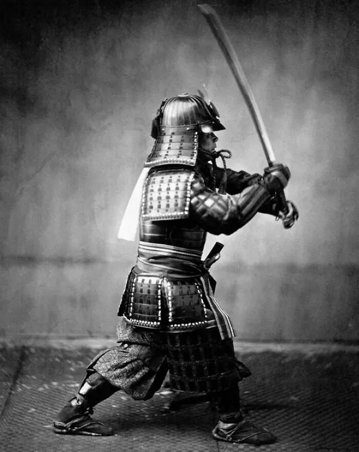A Japanese Samurai In Full Armor With A Sword, 1867