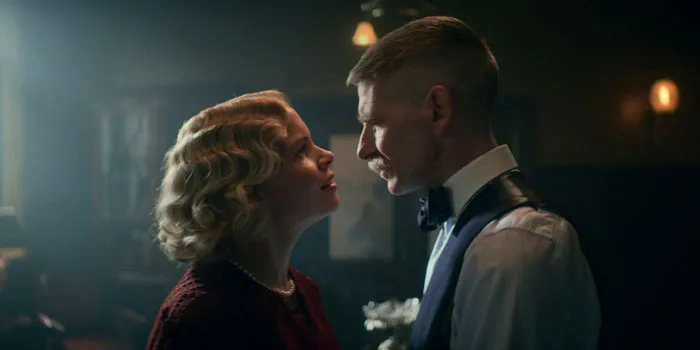 Linda Shelby and Arthur Shelby looking at each other