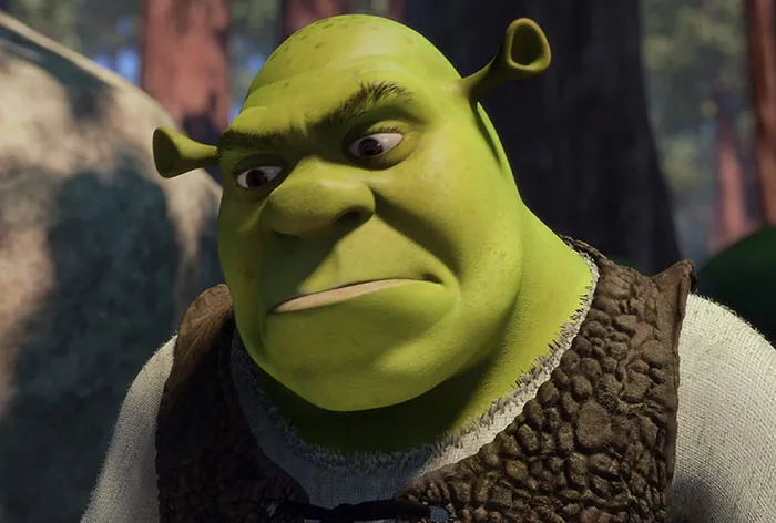 Shrek looking angry in the deep swamp setting, representing memorable Shrek quotes from the swamp.