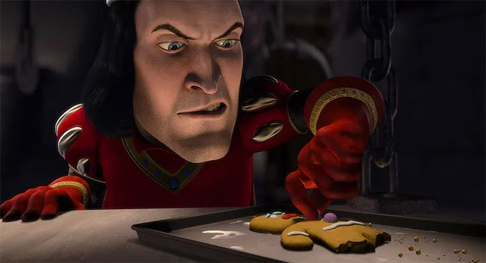 Man in red outfit grimacing while pressing down on a gingerbread man in pain from Shrek quotes about the deep swamp.