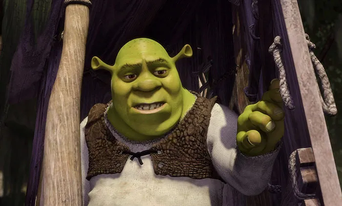 Shrek smiling and talking in his swamp, a beloved character featured in popular Shrek quotes from the deep swamp.