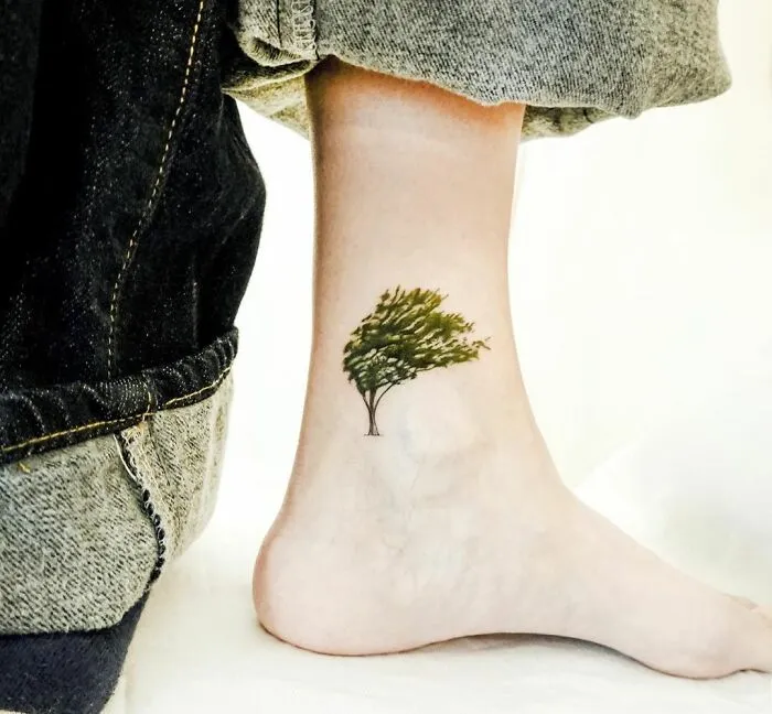 Tree On A Windy Day Ankle Tattoo