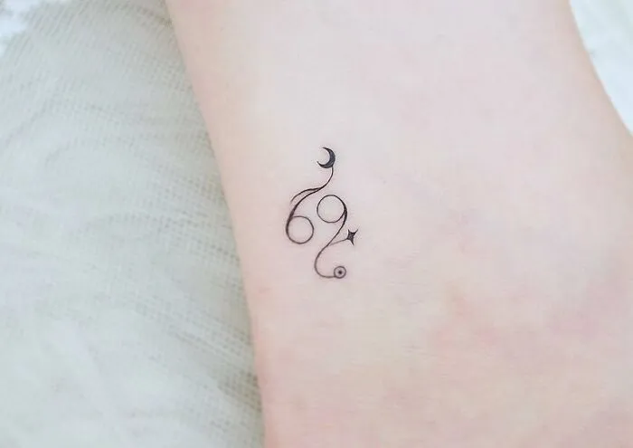 Cancer And Moon Ankle Tattoo