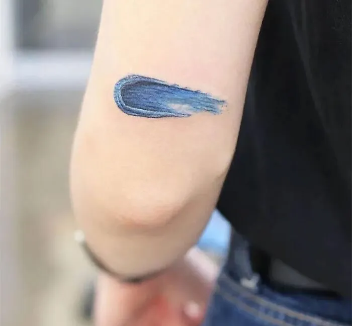 Brushstroke Elbow Tattoo