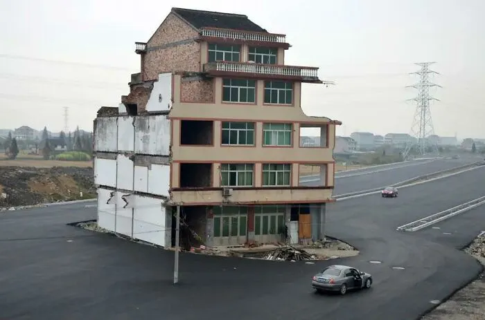 Forcing This Road To Surround Their House