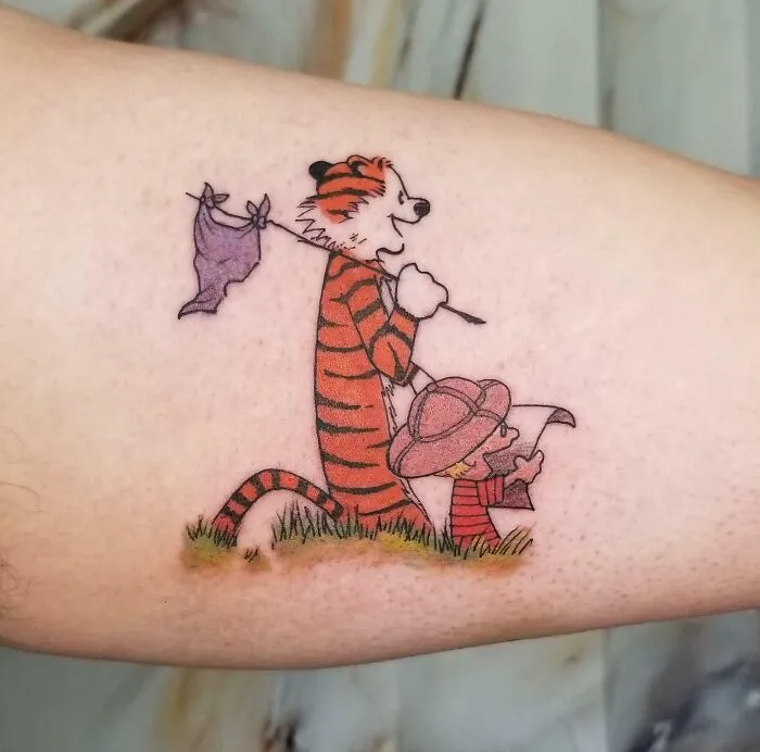 Calvin And Hobbes Arm Tattoo