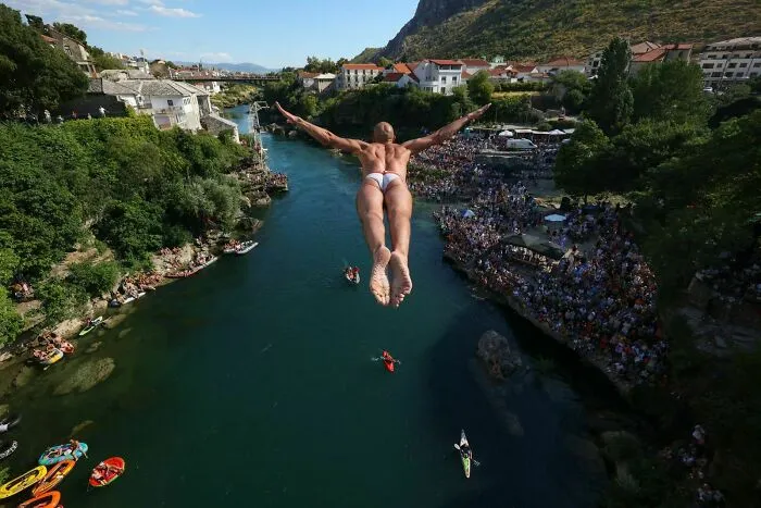 Aquatic - Category Winner, Bronze: "Bosnia Old Bridge Diving" By Armin Durgut
