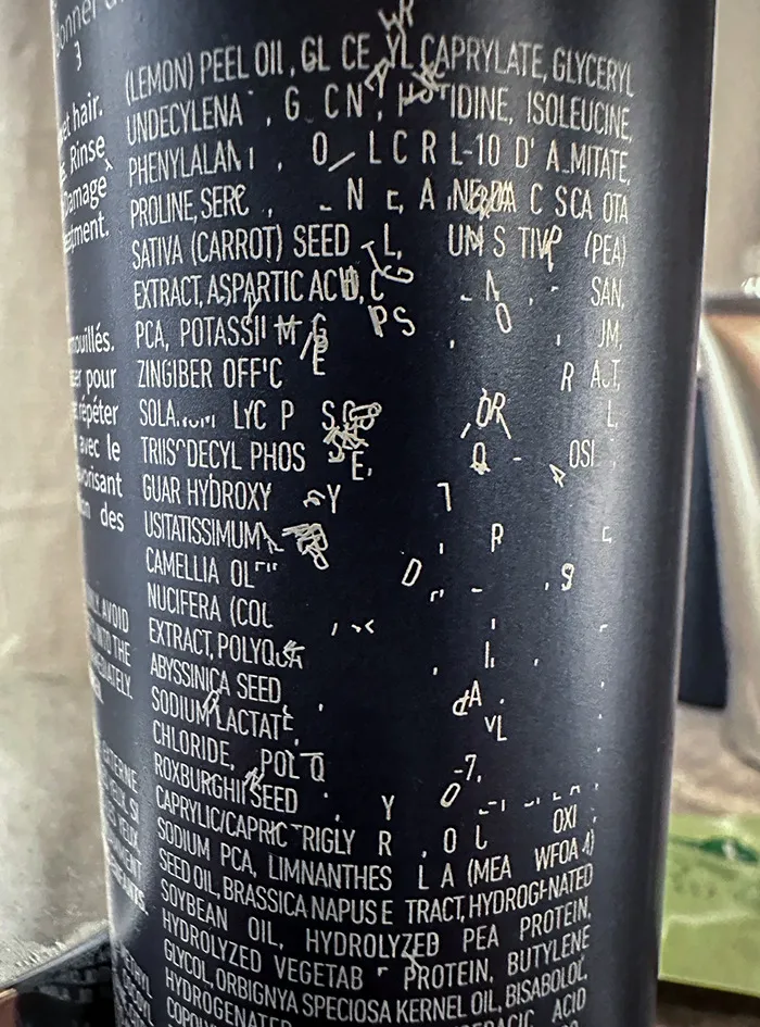 The Way The Sticker On This Shampoo Bottle Has Worn Looks Like A Letter Tornado