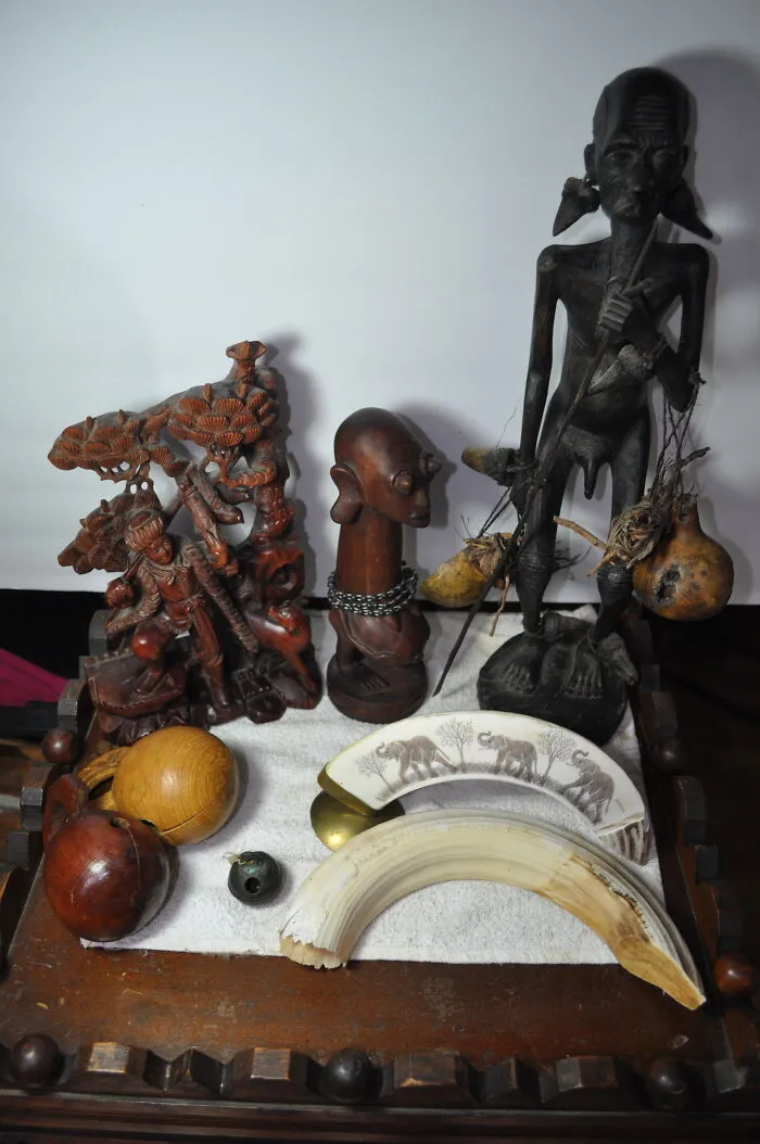 I Own Lots Of Odd Stuff But I'll Just Post A Couple Of Photos. Clockwise (More Or Less) - Small Round - Quaker Horse Sleigh Bell - Salem County, Late 1800s - Bronze.  Large Rounds - Wooden Korean Moktaks (Woodend Handbell Used By Buddhists).  Wooden Carving - Hunter Scene. Unsure Of Country. Depicts What Would Perhaps Be A Traditional English Hunter But The Man Looks Asian. Asian Signature On Bottom But I Don't Know Which Language.  Wooden Fertility Statue. Africa (Continent) But Unsure Which Country. Possibly Kenya.   Wooden Medicine Man Carving.  Same Source As The Fertility Statue.  Hippo Teeth - Engraved And Raw. From A Sustainable / Legal Source Many Years Ago