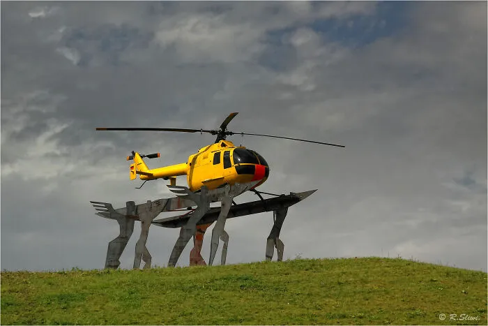 The Yellow Angle. A Helicopter Who Saved Dozens Of Lives After Car Crashes Turned Into A Statue At The Kamener Kreuz In Germany