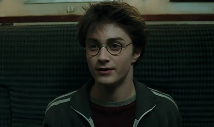 Harry Potter sitting on the sofa