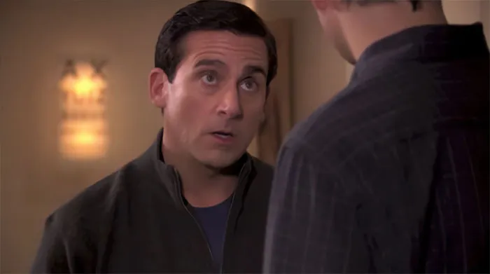 Michael Scott in a serious conversation with Gabe, showcasing memorable moments from Michael Scott quotes and the best boss ever.