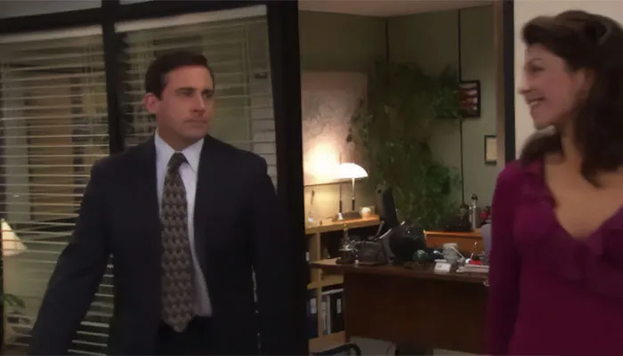 Michael Scott and Donna Newton standing near an office door, highlighting iconic Michael Scott quotes and leadership moments.