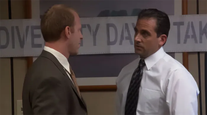 Michael Scott talking to Toby in an office setting, illustrating characters from popular Michael Scott quotes about leadership.