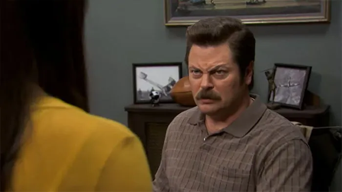 Ron Swanson looking angry and serious, embodying iconic Ron Swanson quotes about life and wisdom.