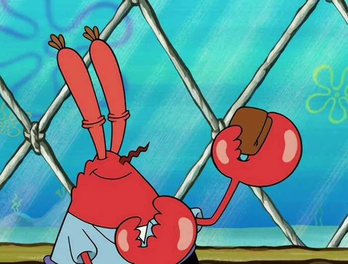 Mr. Krabs proudly raising his wallet in a scene from SpongeBob, one of 104 iconic SpongeBob quotes moments.