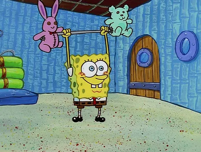 SpongeBob lifting plushie weights overhead in a colorful room, showcasing one of the iconic SpongeBob quotes moments.