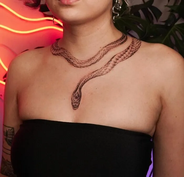 Snake Tattoo On The Neck