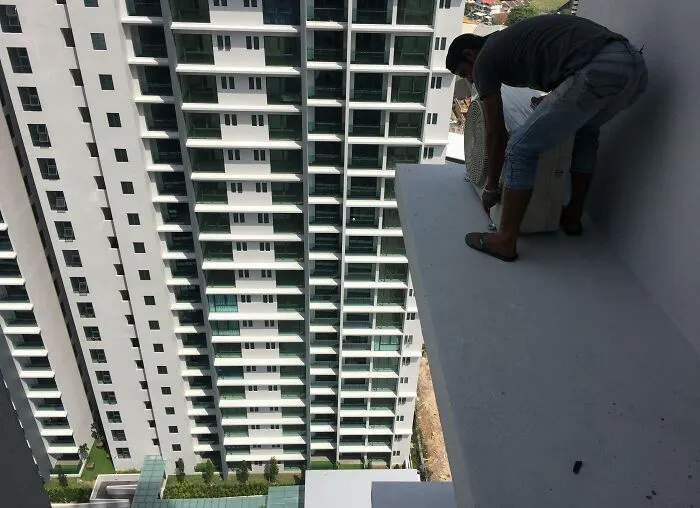 Fixing An AC Compressor On A Level 28 Ledge