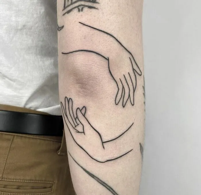 Hug Elbow Tattoo