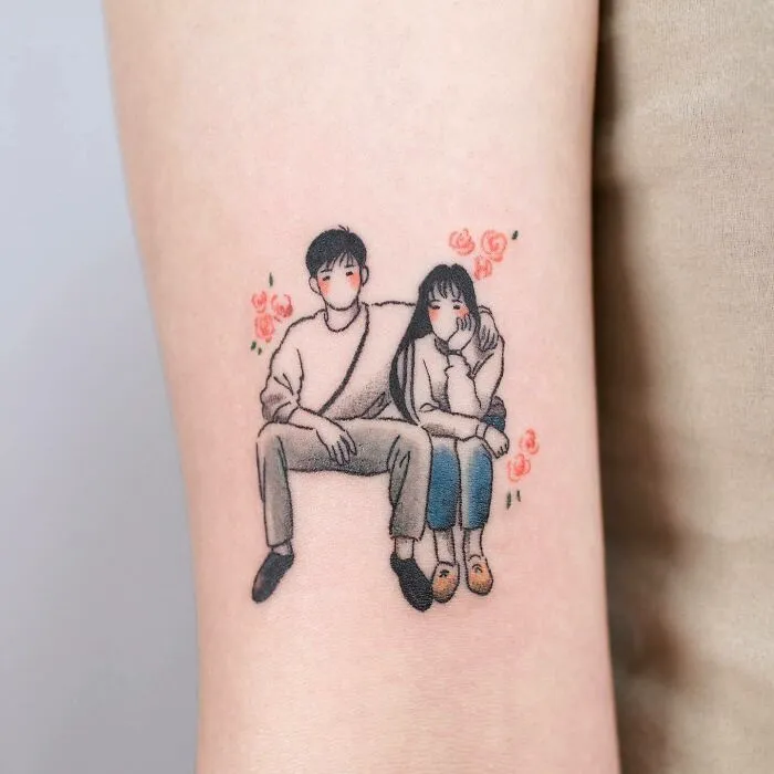 Tattoo of a couple sitting with flowers, symbolizing unbreakable family bonds.