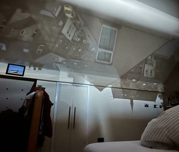 When My Blind Is Open Just The Right Amount, My Bedroom Becomes A Giant Pinhole Camera