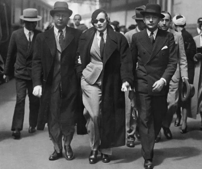 Marlene Dietrich Is Detained At A Train Station In Paris In 1933 For Violating The Ban On Women Wearing Trousers
