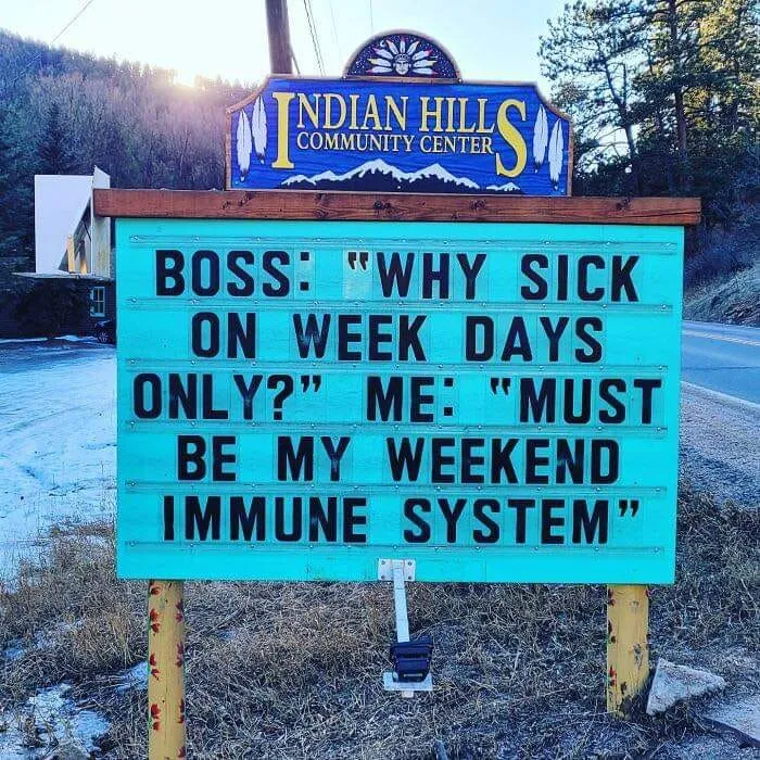 Funny work meme with sign saying: "Boss: 'Why sick on weekdays only?' Me: 'Must be my weekend immune system.'"