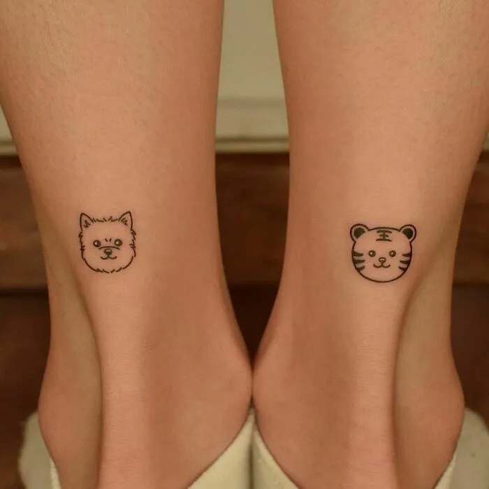 Puppy And Tiger Ankle Tattoo