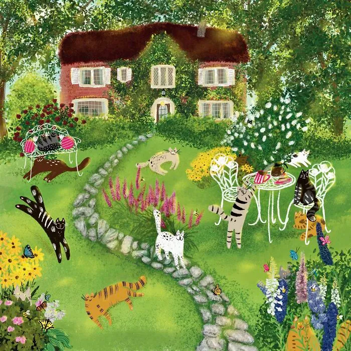 Cats In A Summer Garden Near A House