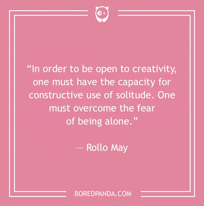 Quote on pink background about solitude and creativity by Rollo May, emphasizing the positive use of being alone.