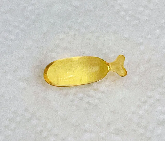 Cápsula de Omega 3 en forma de pez