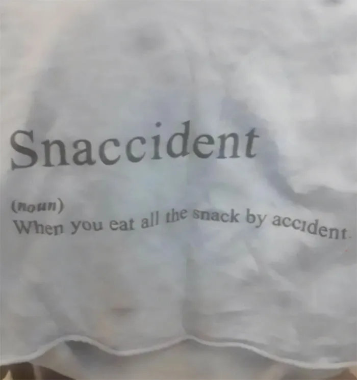 "Text humor meme with 'Snaccident' definition for pun enthusiasts."