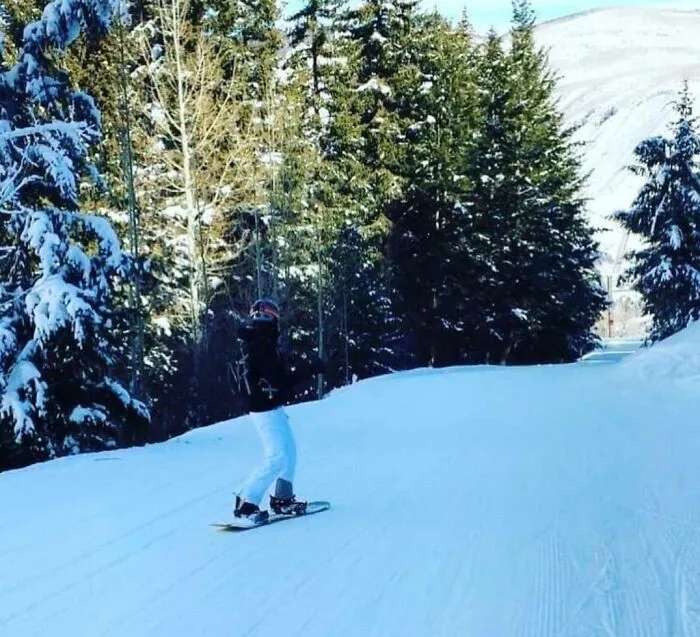 Guy Learning To Snowboard