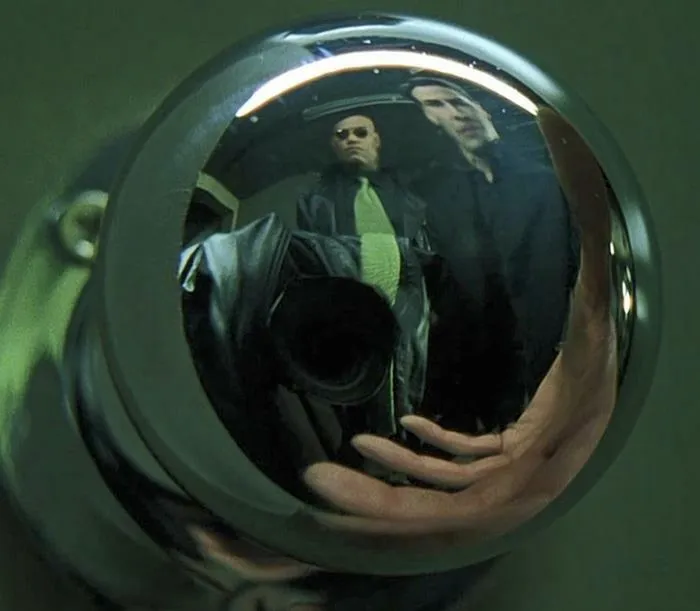 The Director Of Photography ( On The Matrix) Hid Him Self Using A Coat With A Tie Matching The One Morpheus Was Wearing, Trying To Blend In As Much As Possible