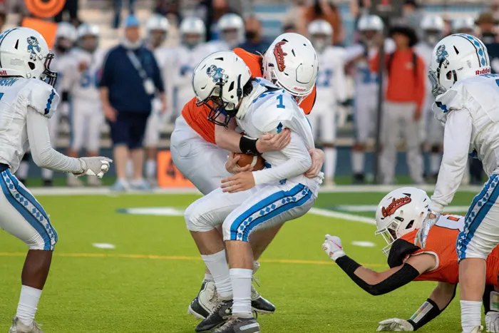 American football players during game