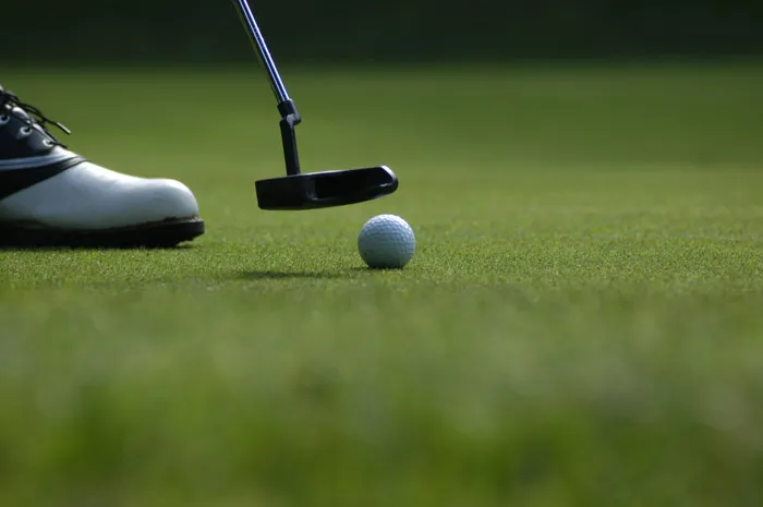 Person playing golf