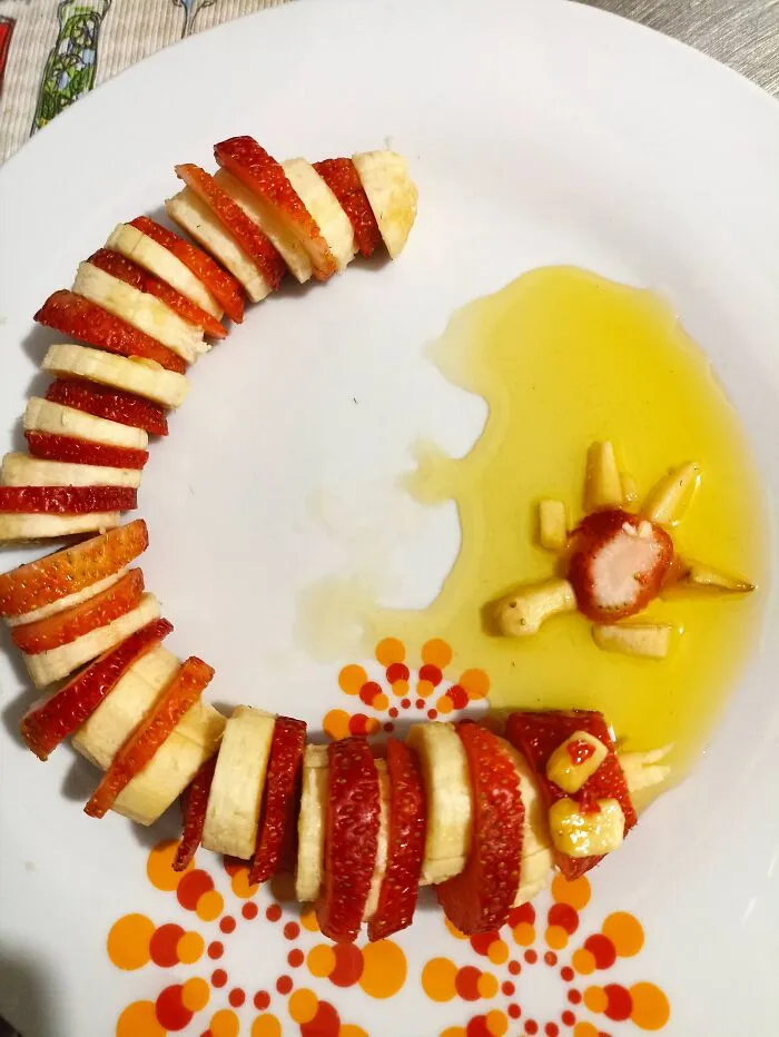 Banana And Strawberry Snake Drinking From A Lake Of Honey With A Small Turtle Swimming In It. By Abigail, 9 Years Old