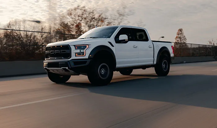 White Pickup Truck on the Road