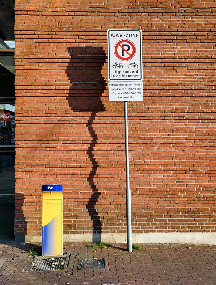 This Brick Wall Making A Zig-Zagged Shadow