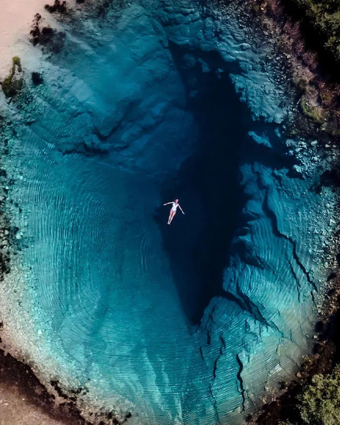 It's 50% Exciting And 50% Scary. The Hole Is 150 Meters Deep, And It's Actually Way Too Cold To Swim In There For Longer Than A Few Seconds