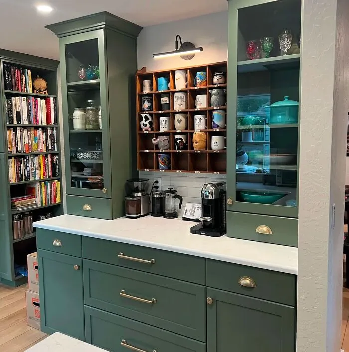 Soft Green Cabinets With Glass Doors