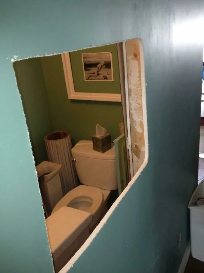 A Friend Of Mine Cut A Hole In His House Because They Found A Drain Pipe On The Other Side And Wanted To Know Where It Went, And There Was Dead Space. This Is What They Found. With A Kleenex Box And Wall Art Still There